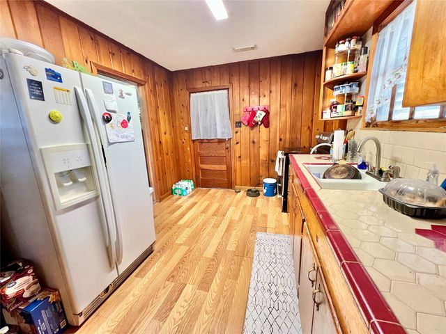 6321 Tacquard Drive, Hitchcock, TX 77563