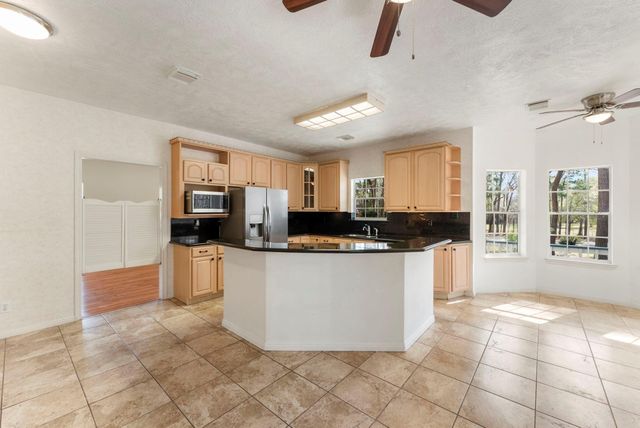 19203 Indigo Lake Drive, Magnolia, TX 77355