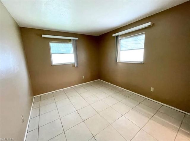 10 Temple CT, Lehigh Acres, FL 33936