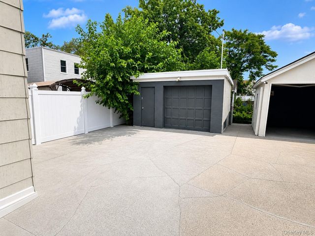 10713 Sutter Avenue, Ozone Park, NY 11417