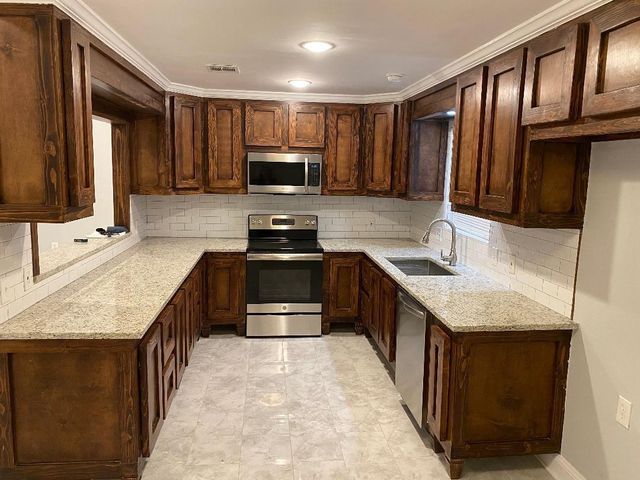 10451 N Essex Drive, Conroe, TX 77302