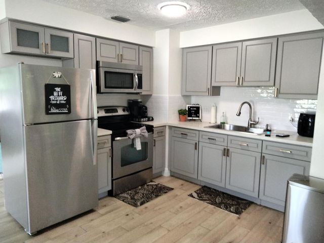 1150 NE County Line Road, Jensen Beach, FL 34957