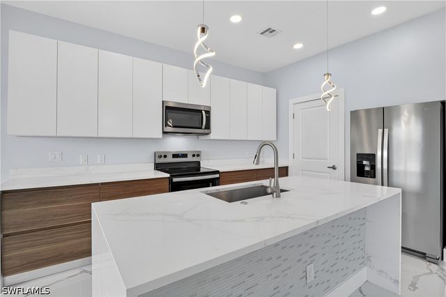 454 Mercedes CT, Lehigh Acres, FL 33972