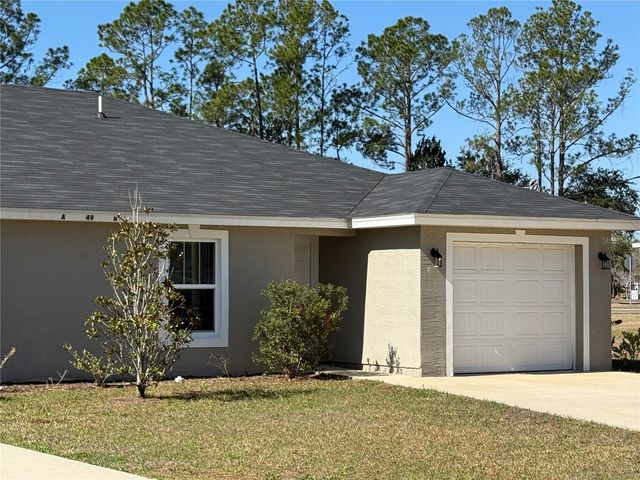 49 BRUNSWICK LANE A, Palm Coast, FL 32137