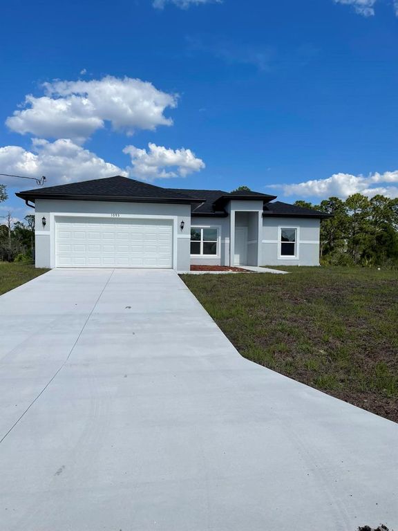 322 Mangonia Avenue, Lehigh Acres, FL 33974