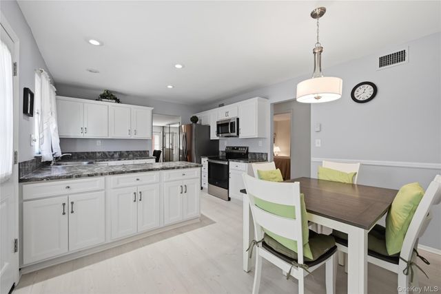 506 Lancaster Court, Ridge, NY 11961