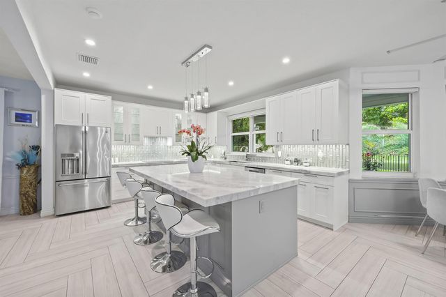 12253 Glenmore Drive, Coral Springs, FL 33071