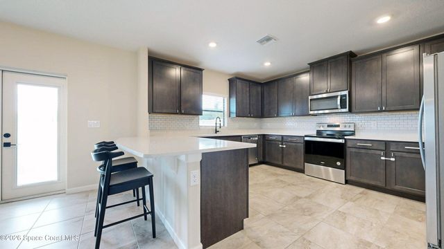 4607 Broomsedge Circle, West Melbourne, FL 32904