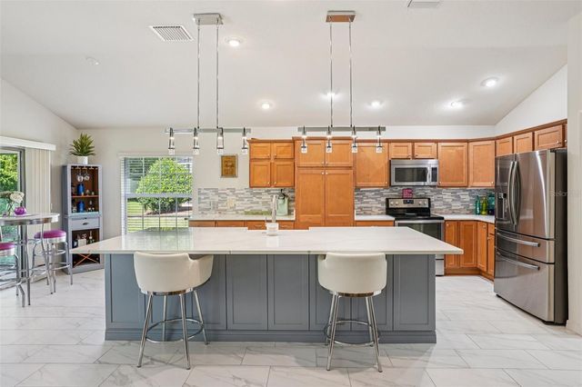 10063 LAKE MIONA WAY, Oxford, FL 34484