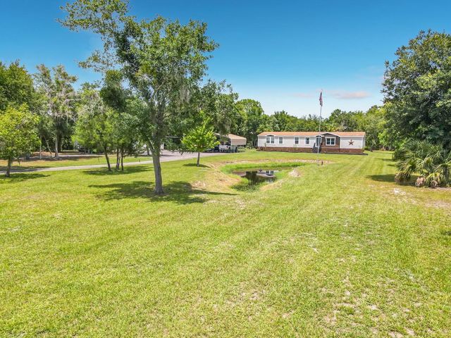 353 URANUS TRAIL, Osteen, FL 32764