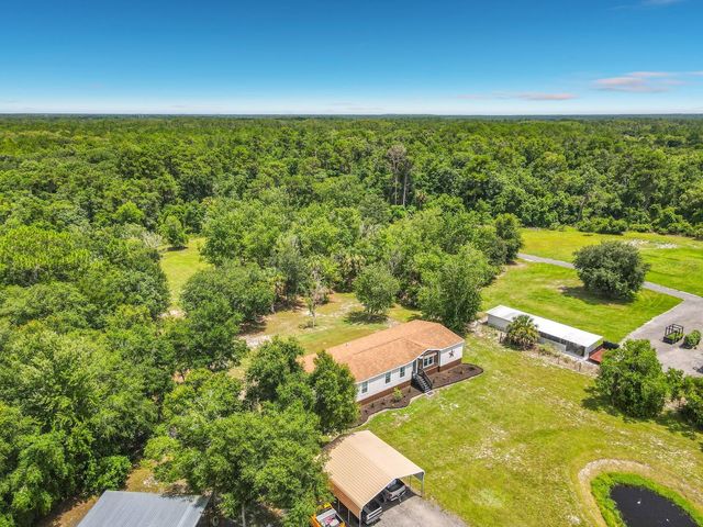353 URANUS TRAIL, Osteen, FL 32764