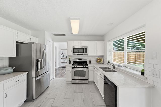 9211 Wandsworth Drive, Spring, TX 77379