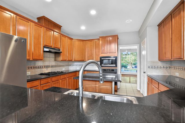 3314 Crimson Maple Court, Houston, TX 77345