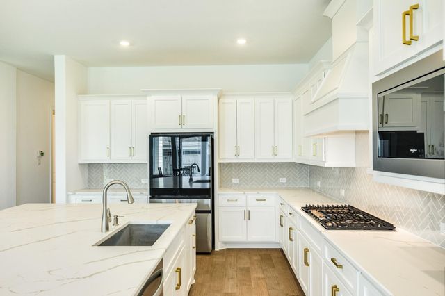 5202 Wolf Creek Court, Manvel, TX 77578
