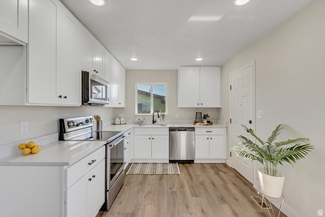 1916 N CELIA WAY, Layton, UT 84041