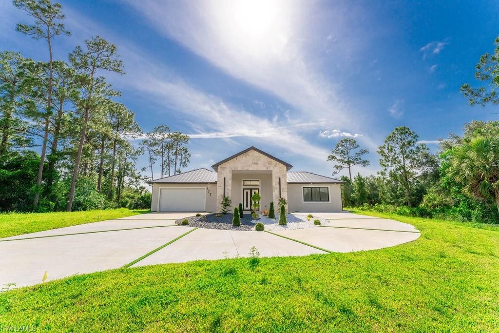 717 Calvin AVE, LEHIGH ACRES, FL 33972 — exterior