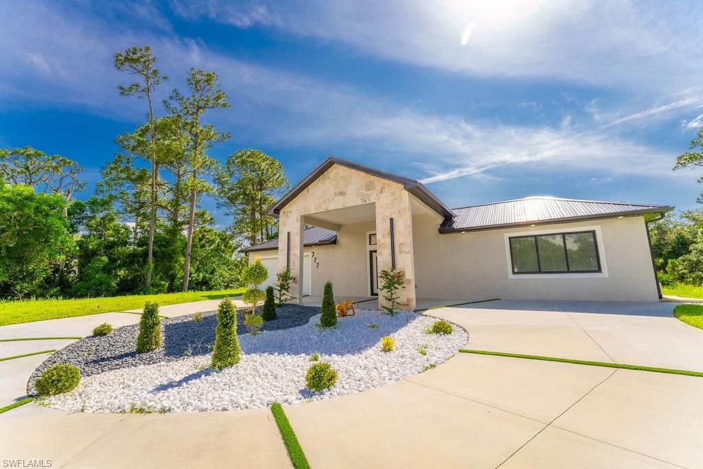 717 Calvin AVE, LEHIGH ACRES, FL 33972 — photo 4