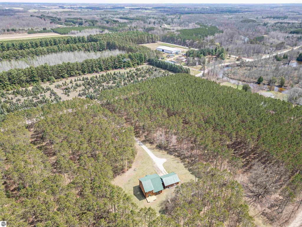 Image 74 of property listing at 753 N School Road, Weidman, MI 48893