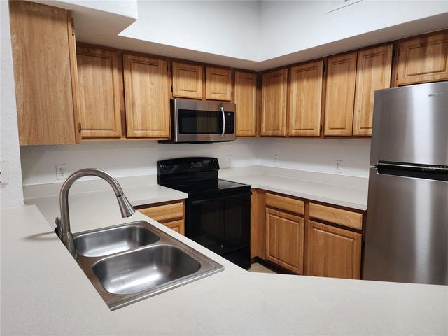 13037 MULBERRY PARK DRIVE 517, Orlando, FL 32821