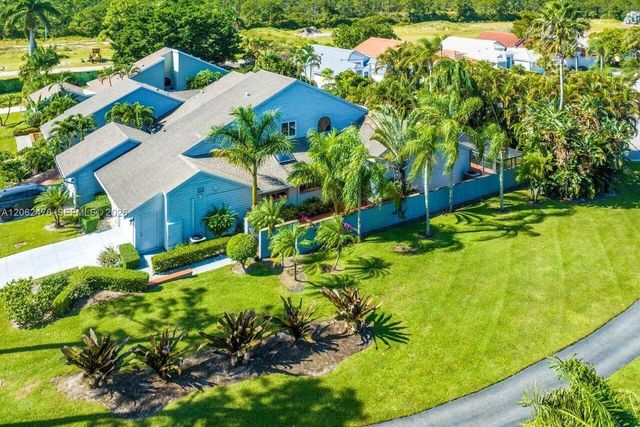 6879 Palm Grove Court, Palm Beach Gardens, FL 33418