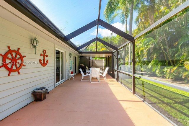 6879 Palm Grove Court, Palm Beach Gardens, FL 33418