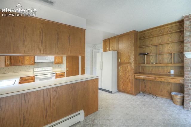 3007 Chelton Drive, Colorado Springs, CO 80909