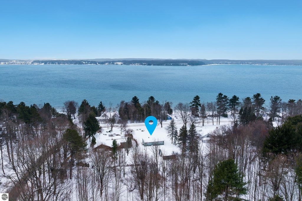 Image 1 of property listing at 5813 Pennington Drive, Beulah, MI 49617