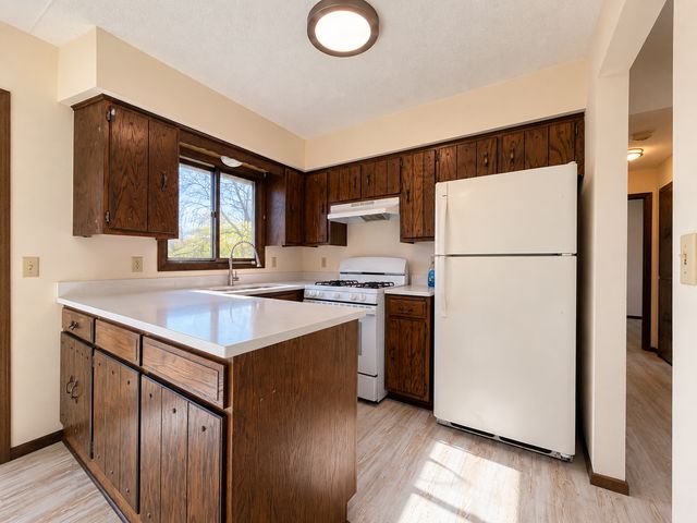 8223 Brunswick Circle N, Brooklyn Park, MN 55443