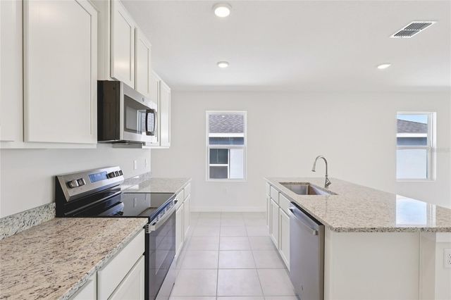 1925 DIAMOND HEAD CIRCLE, Haines City, FL 33844