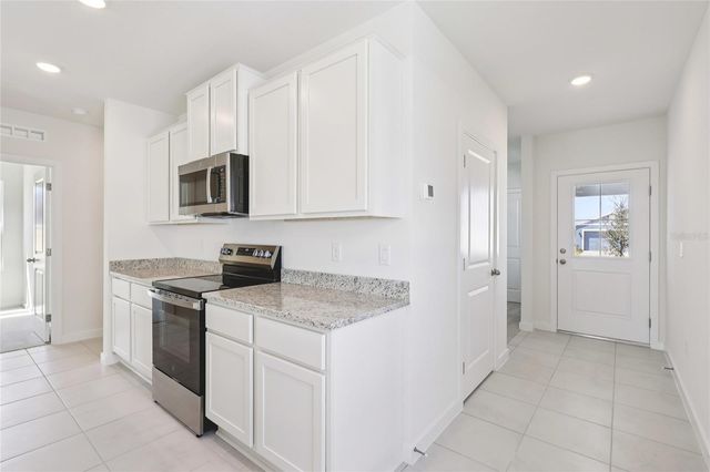 1925 DIAMOND HEAD CIRCLE, Haines City, FL 33844