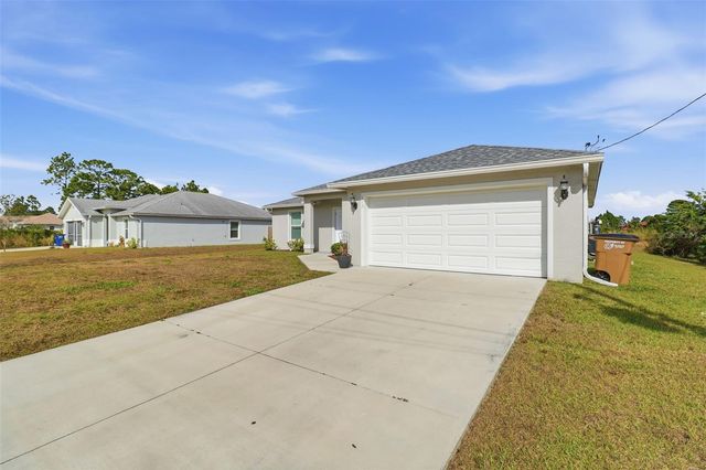 117 PAXTON STREET, Lehigh Acres, FL 33974