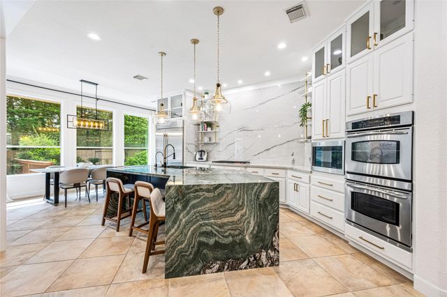 59 Nocturne Woods Place, The Woodlands, TX 77382