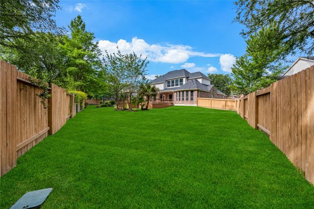 59 Nocturne Woods Place, The Woodlands, TX 77382