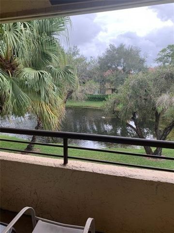 701 Lyons Road 13206, Coconut Creek, FL 33063