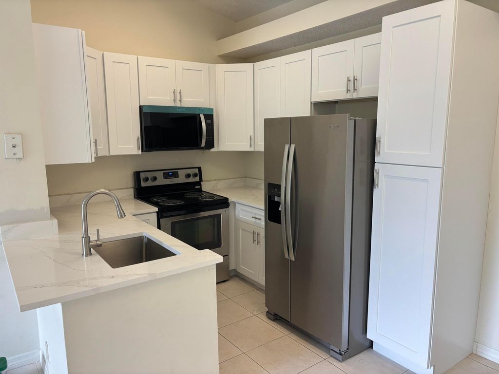 701 Lyons Road 13206, Coconut Creek, FL 33063