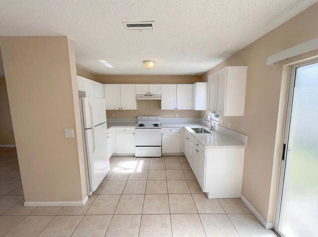 1118 SE Proctor Lane, Port St. Lucie, Port St Lucie, FL 34983