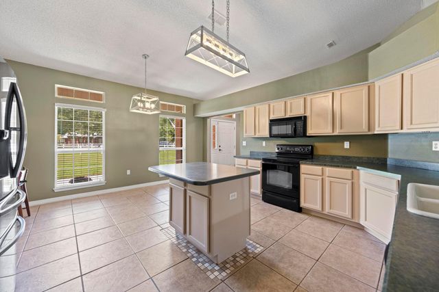 1177 Blackberry Circle, Baker, FL 32531