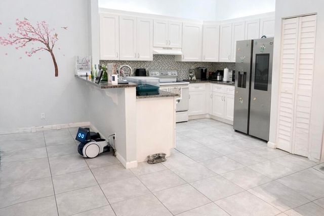 4373 Woodstock Drive D, West Palm Beach, FL 33409