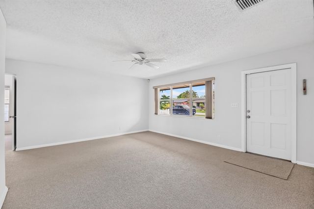 129 GREENBRIER Drive, Palm Springs, FL 33461