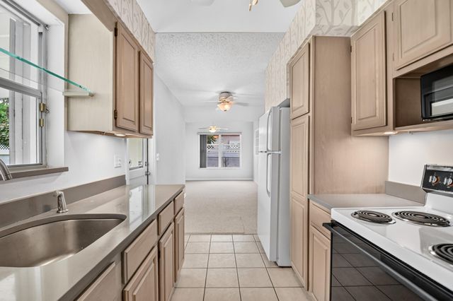 129 GREENBRIER Drive, Palm Springs, FL 33461