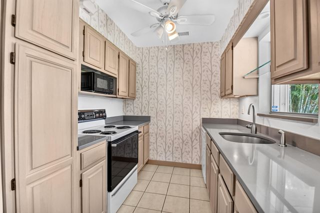129 GREENBRIER Drive, Palm Springs, FL 33461