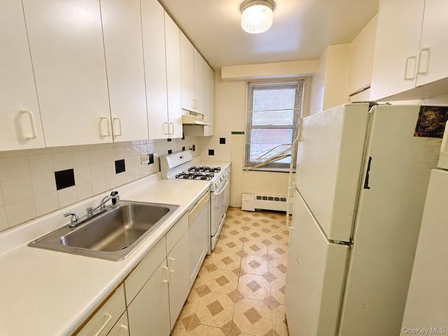 61-15 97th Street 1A, Rego Park, NY 11374