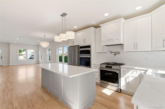 13 Evelyn Avenue, Westbury, NY 11590