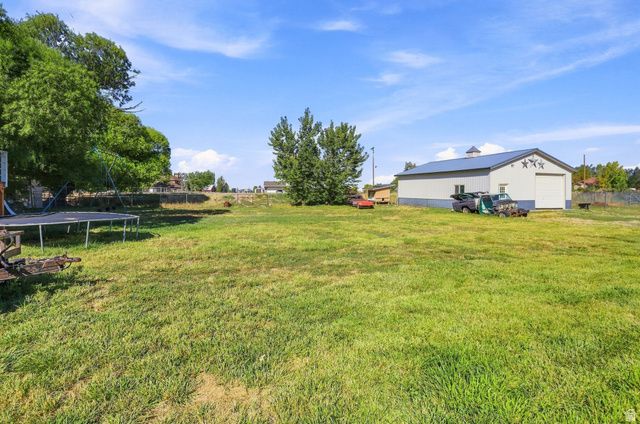 3207 N PELICAN DR, Farr West, UT 84404
