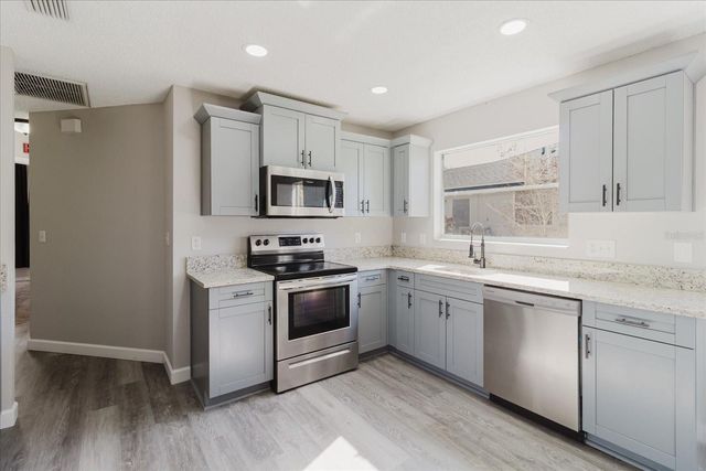 1638 POLO CLUB DRIVE, Tarpon Springs, FL 34689