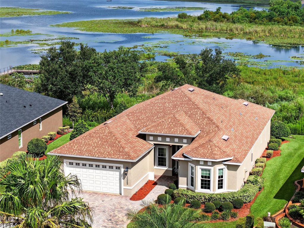 Image 2 of property listing at 10089 LAKE MIONA WAY, Oxford, FL 34484