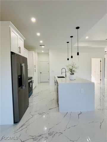 163 Carlisle AVE S, Lehigh Acres, FL 33974