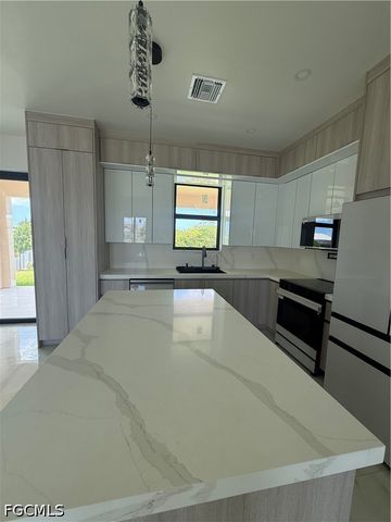 124 SE 2nd AVE, Cape Coral, FL 33990