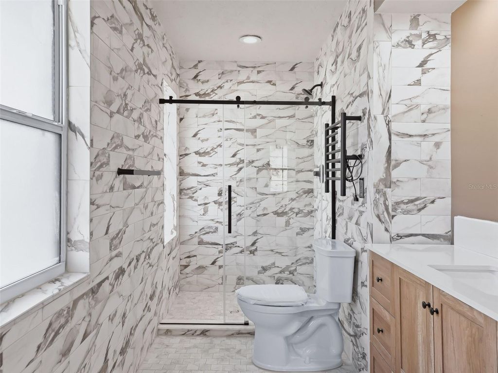 Image 21 of property listing at 10916 SE TIMUCUAN ROAD, Summerfield, FL 34491