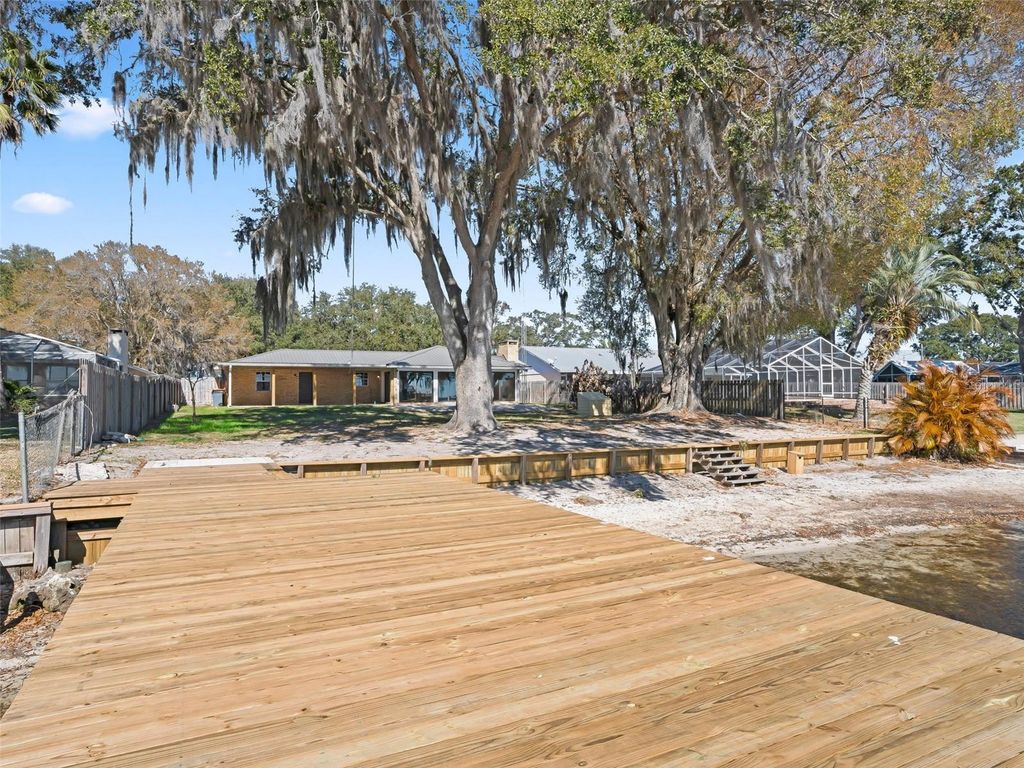 Image 35 of property listing at 10916 SE TIMUCUAN ROAD, Summerfield, FL 34491